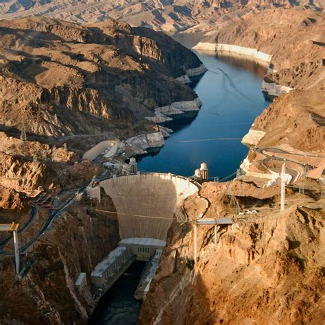 Hoover dam photos - 36 00 57.7 N. 114 44 14.8 W. The Hoover Dam, a 726-foot high-arch gravity structure, was the greatest constructed project at that time and remains one of the highest concrete dams in the Western Hemisphere. In 1918, the U.S. Reclamation Service's director and chief engineer Arthur P. Davis proposed a dam of unprecedented height to control the ...